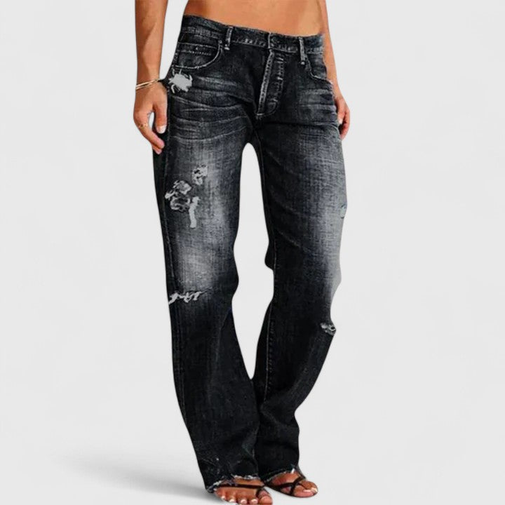 Stylish women's wide-leg denim jeans, providing a relaxed fit and elegant look for ladies apparel.