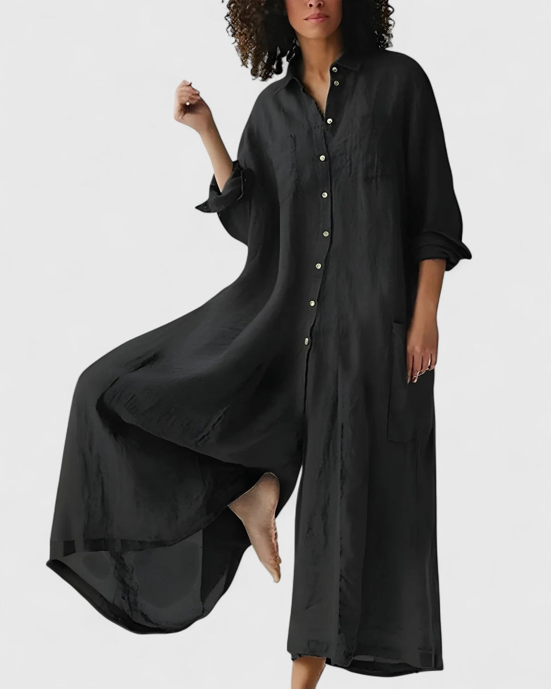 Modern women's effortless wide-leg jumpsuit dress, combining comfort and chic style for any summer occasion or casual outing.