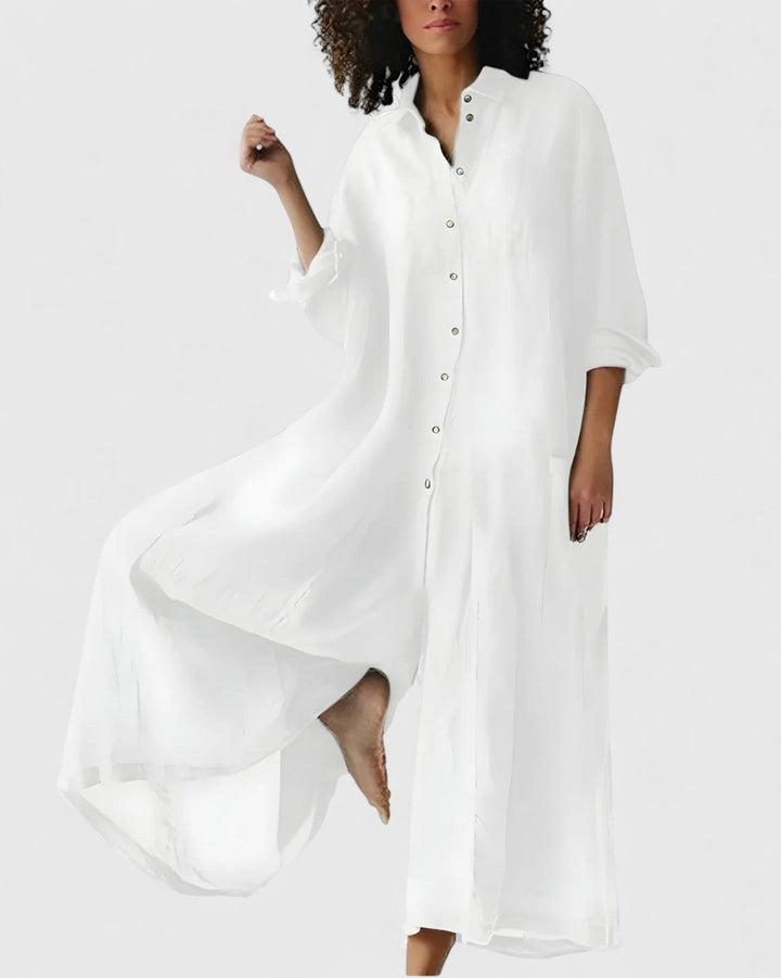 Sophisticated women's wide-leg jumpsuit dress, showcasing a graceful silhouette. Perfect for comfortable, versatile summer style.