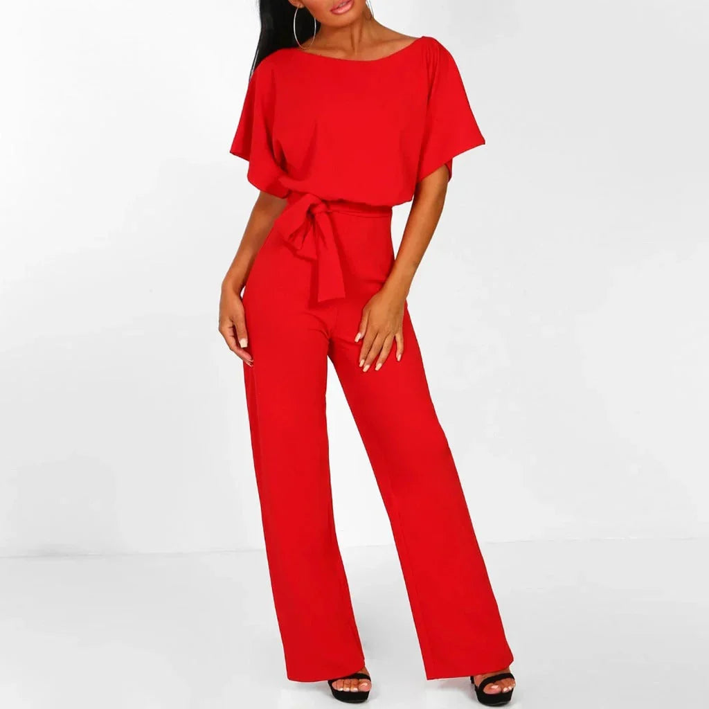 Stylish plus size women's jumpsuit. Elegant wide leg design for autumn outfits.