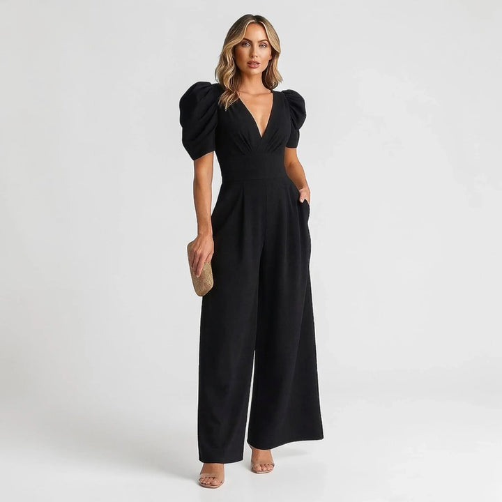 Formal women's jumpsuit with flattering wide legs and elegant puff sleeves, designed for special events.