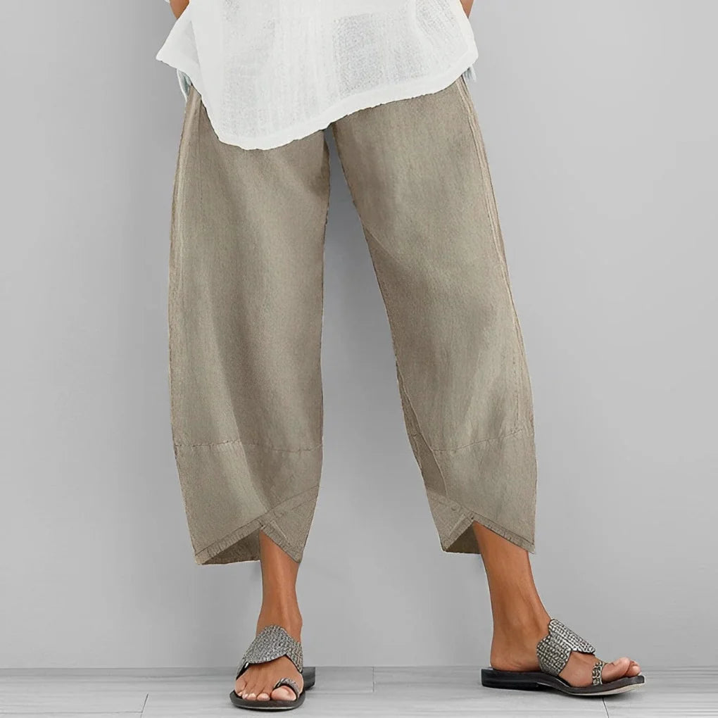Elegant women's wide-leg satin trousers, perfect for formal evening wear. Chic, high-rise luxury pants.