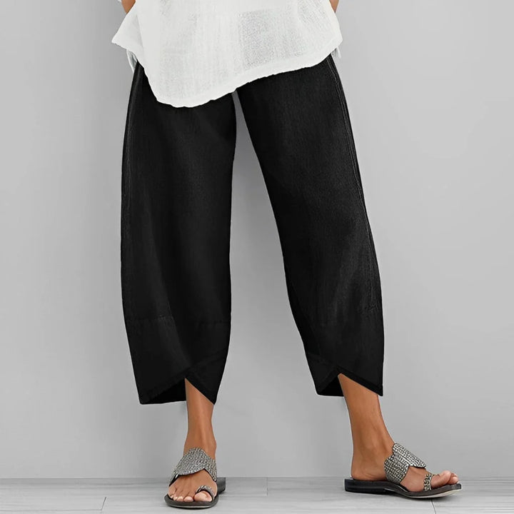 Stylish women's wide-leg satin trousers with a comfortable, flowy fit. High-rise elegant formal bottoms.