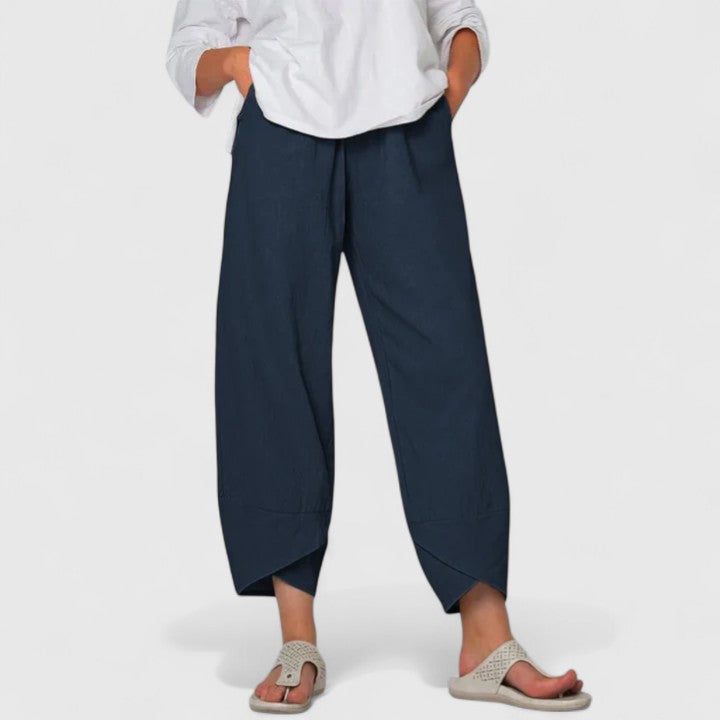 Flowy women's wide-leg pants, designed for elegant comfort and versatile fashion styling.