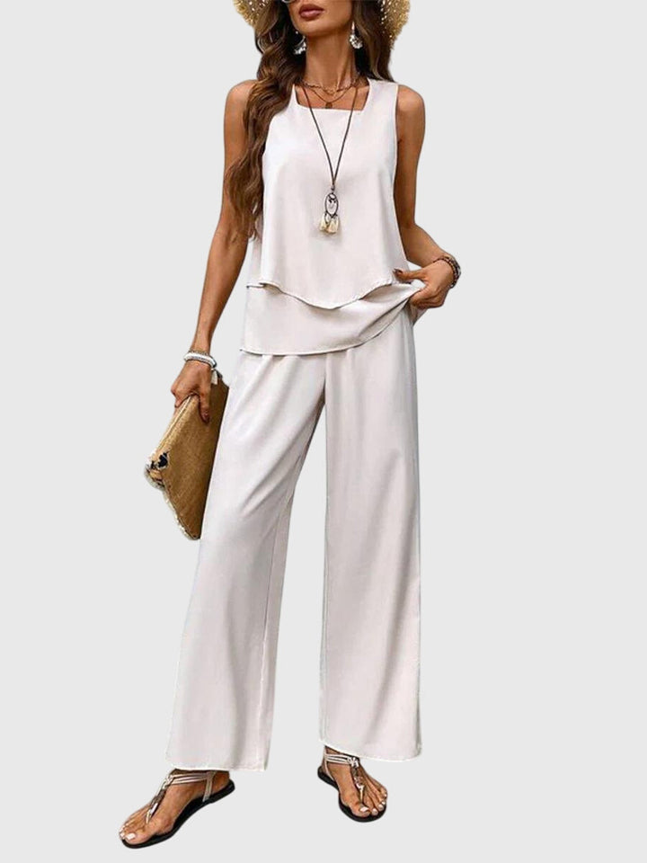 Versatile women's wide leg two-piece summer set, perfect for casual wear, resort fashion, or elegant summer events.