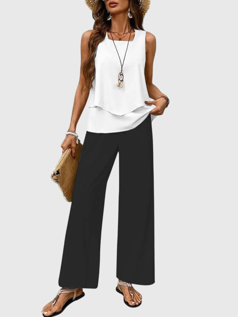 Elegant women's summer outfit: a fashionable two-piece set with a sleeveless top and relaxed wide leg pants.