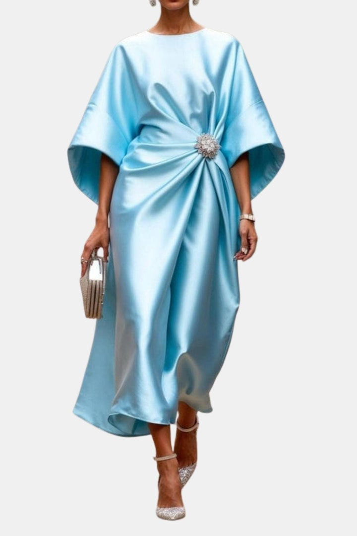 Stylish women's elegant maxi dress featuring wide sleeves. A chic evening gown & sophisticated party wear.