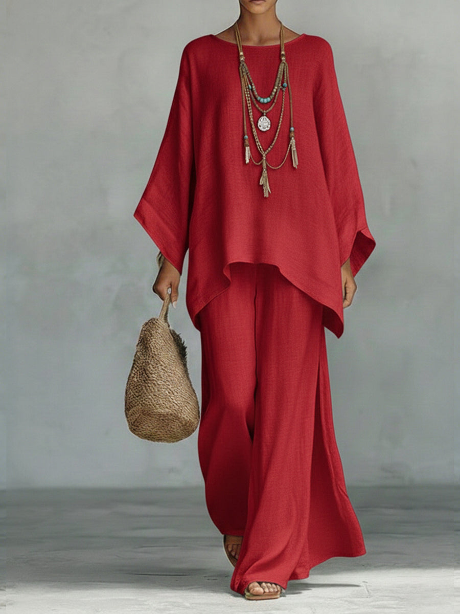 Breathable linen wide sleeve top & trouser set for women. Elegant, comfortable two-piece summer outfit.