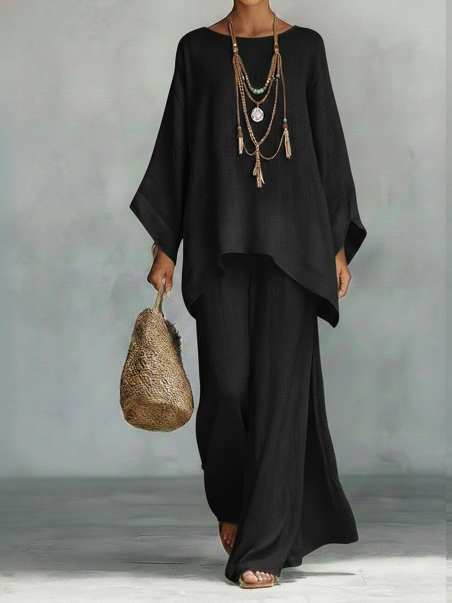 Women's elegant wide sleeve top & wide leg trouser two-piece set. Perfect comfortable linen casual wear.