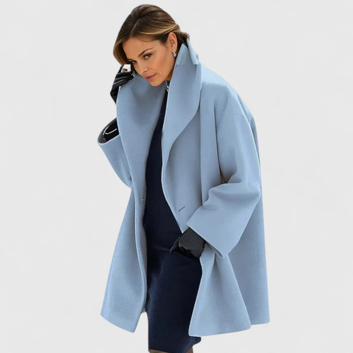 Elegant women's winter coat in a relaxed fit, perfect for staying warm & stylish. Ideal autumn outerwear.