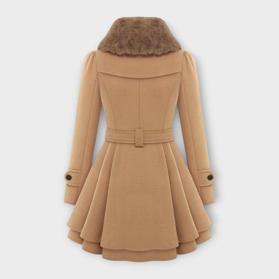 Sophisticated double-breasted long coat for women, featuring a stylish faux fur collar & belted waist.