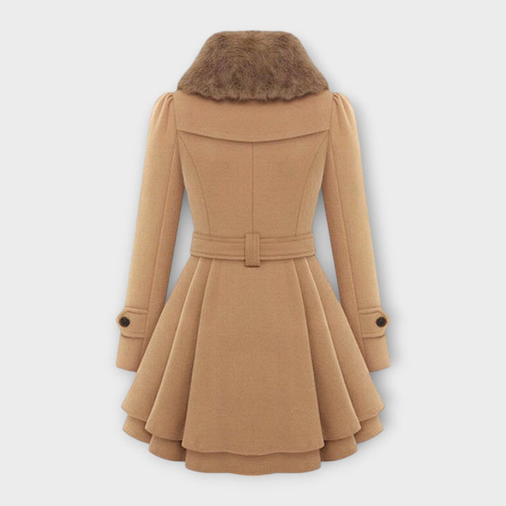 Sophisticated double-breasted long coat for women, featuring a stylish faux fur collar & belted waist.