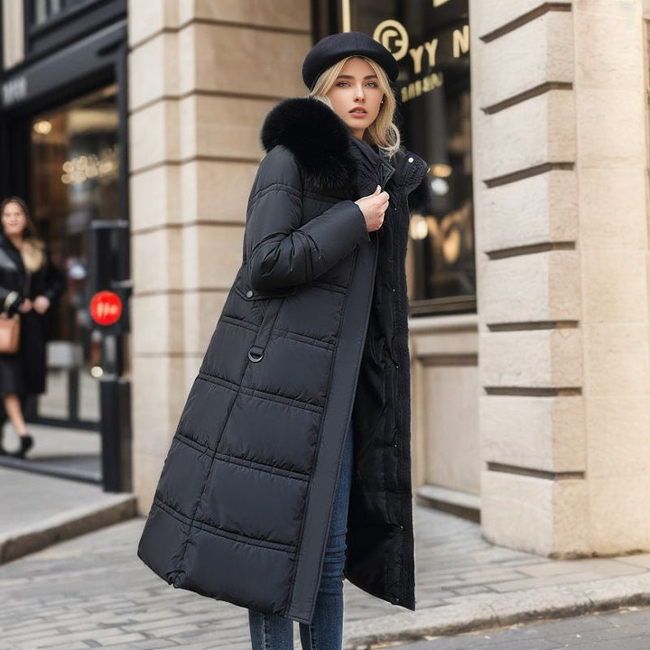 Women's warm winter coat with an elegant design and a practical, removable hood for ultimate cold-weather comfort.