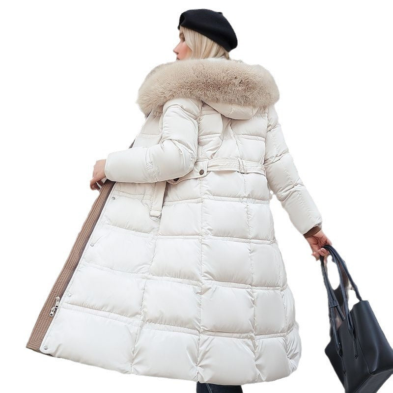 Chic women's winter coat with a flattering tailored fit, warm fabric, and versatile removable hood for elegant style.