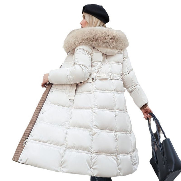 Chic women's winter coat with a flattering tailored fit, warm fabric, and versatile removable hood for elegant style.