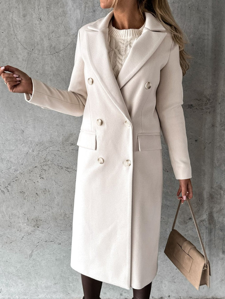 Chic women's winter jacket, providing cozy warmth and elegant style. Perfect long sleeve coat for cold days.