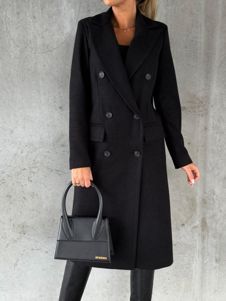 Fashionable women's elegant winter coat. Stylish long sleeve jacket, offering warmth and chic design for cold weather.