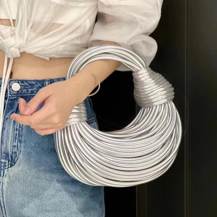 Fashionable women's handbag, new woven design with elegant knot detail, ideal for any occasion.