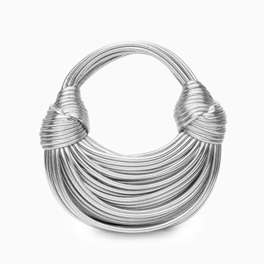Silver woven shoulder bag for women, featuring a stylish knot detail and versatile design.