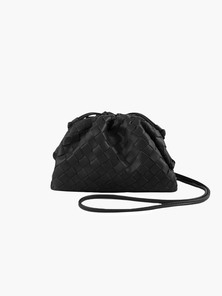 Elegant women's woven shoulder bag. Stylish, compact & versatile for everyday use. Modern handbag with refined texture.