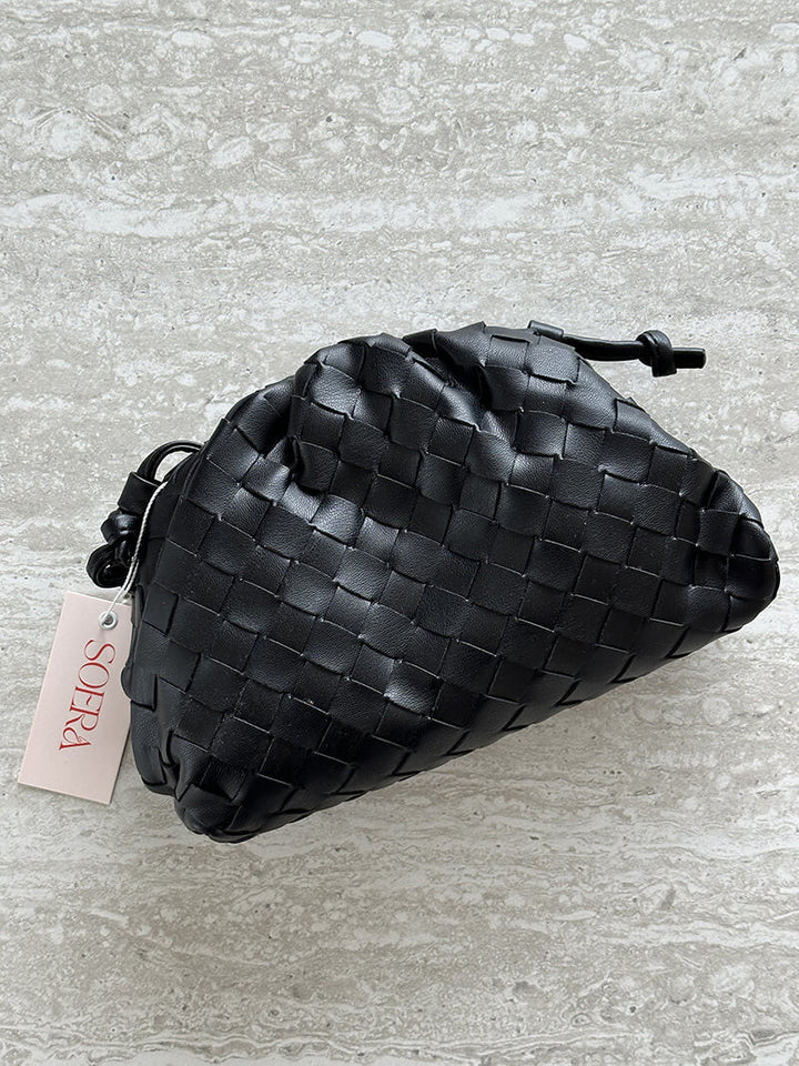 Minimalist women's woven shoulder bag, exuding everyday elegance. A modern, compact & versatile handbag.
