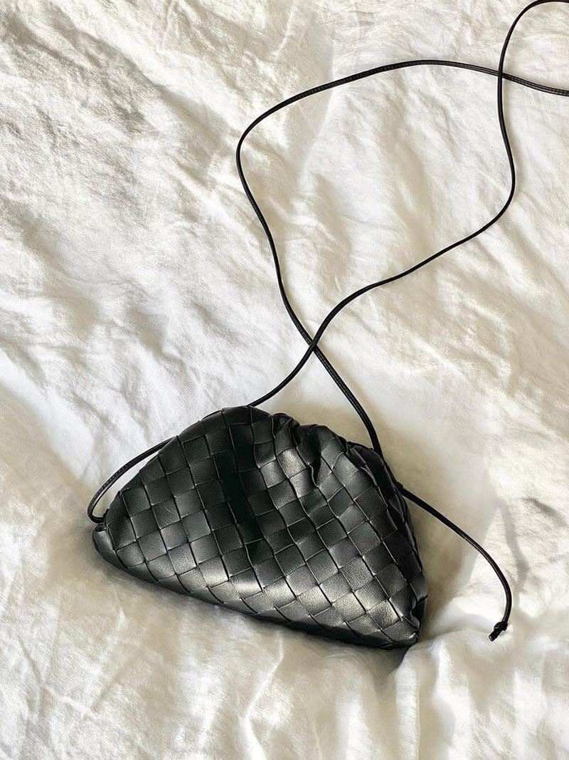 Textured women's woven shoulder bag, offering a sophisticated look. Modern, elegant & compact for everyday style.