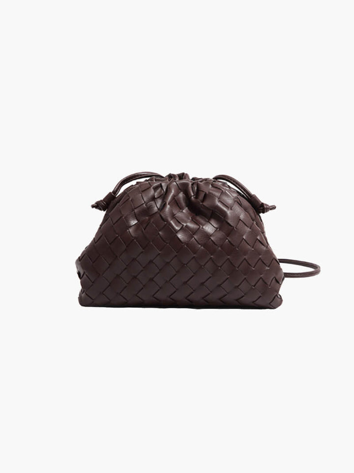 Chic women's woven shoulder bag, showcasing its elegant design & durable construction. A modern everyday handbag.