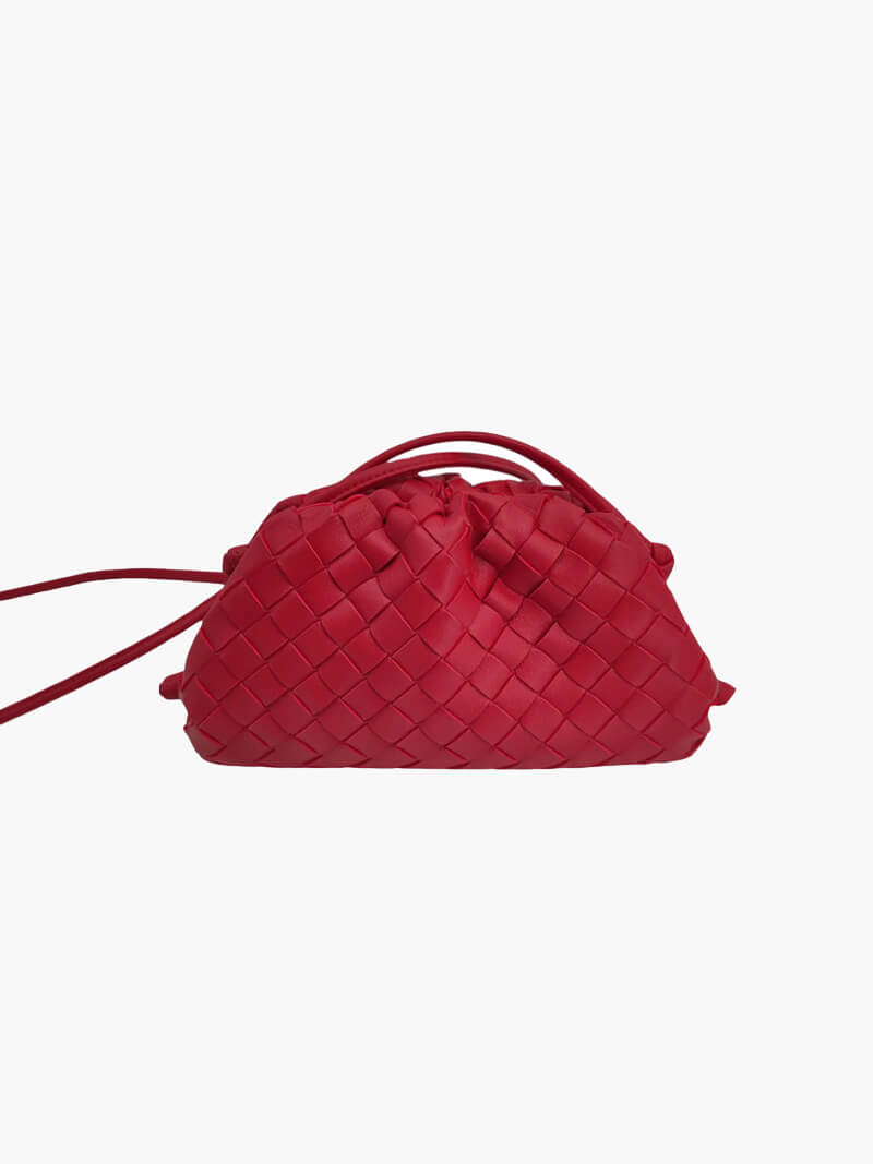 Front view of a minimalist woven shoulder bag for women. Elegant, compact & modern for versatile everyday style.
