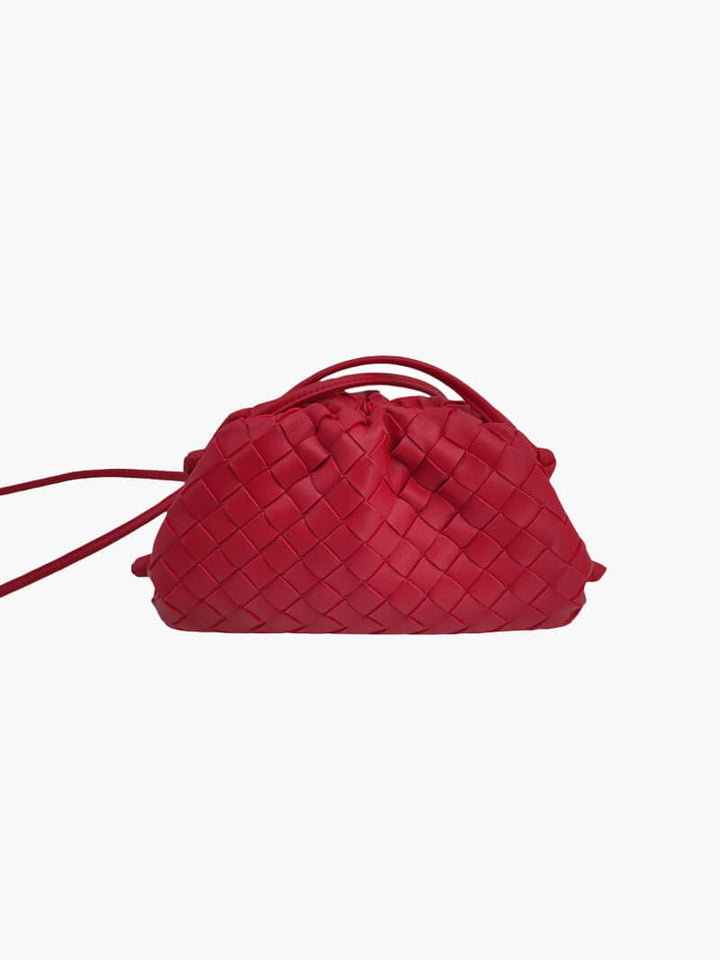 Front view of a minimalist woven shoulder bag for women. Elegant, compact & modern for versatile everyday style.