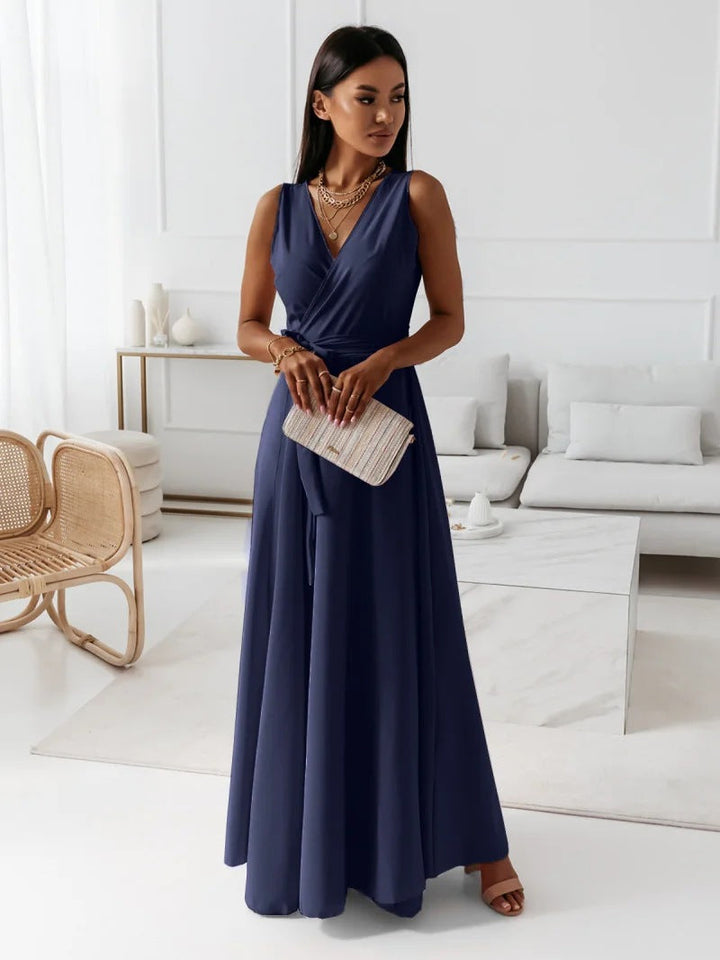 A beautiful, elegant women's V-neck wrap maxi dress, perfect formal wear for wedding guests and parties.