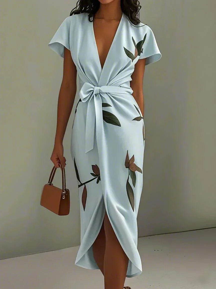 Floral print wrap maxi dress for women, featuring flutter sleeves & V-neck, ideal as a summer day or vacation dress.
