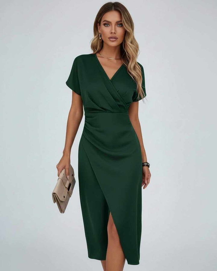 Chic women's summer midi wrap dress featuring a flattering draped waist and elegant split hem.