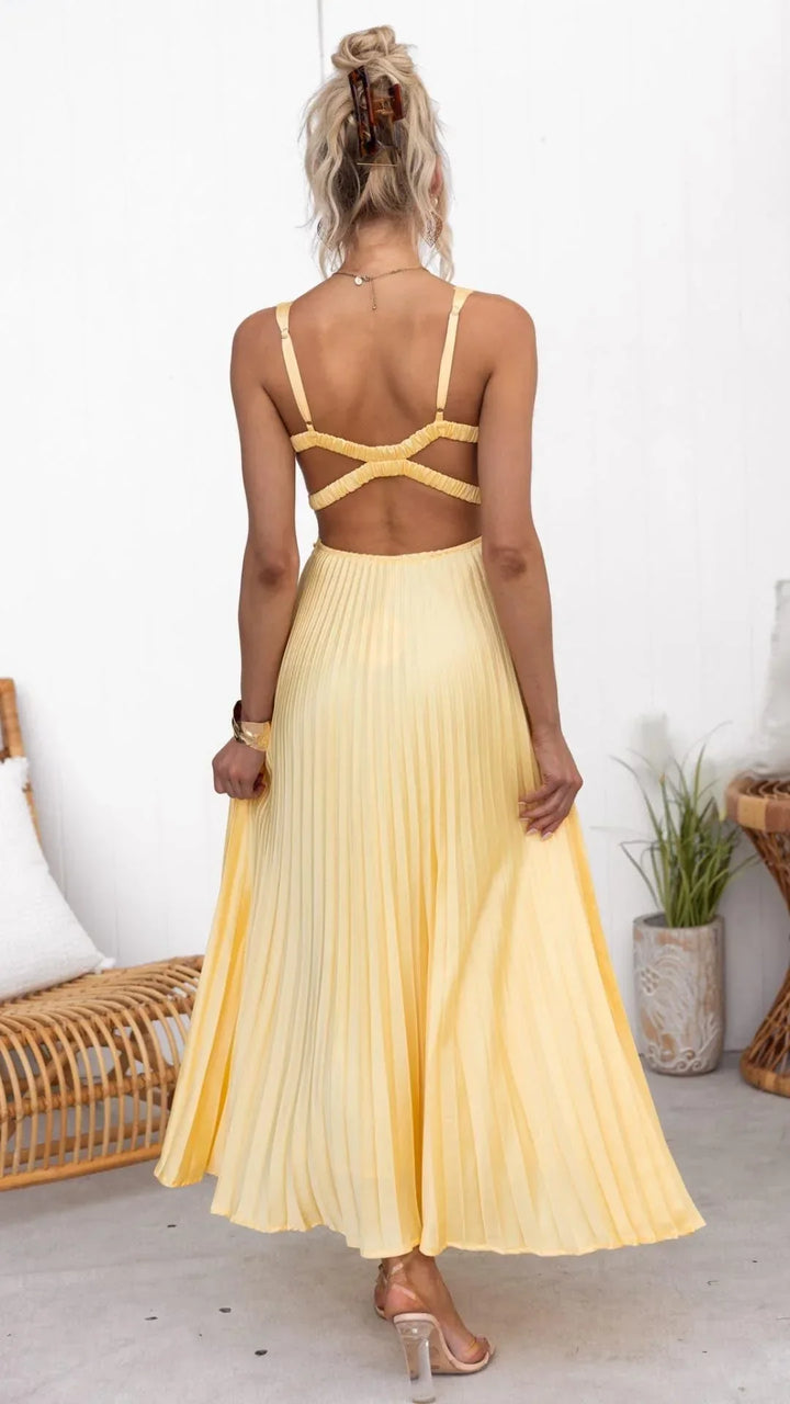 Vibrant yellow V-neck pleated maxi dress, a sophisticated and flowy women's formal or summer occasion gown.
