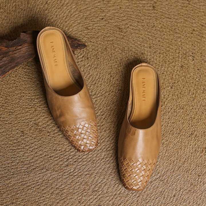 Chic women's footwear: woven square-toe mules with a comfortable low heel, perfect for any occasion.