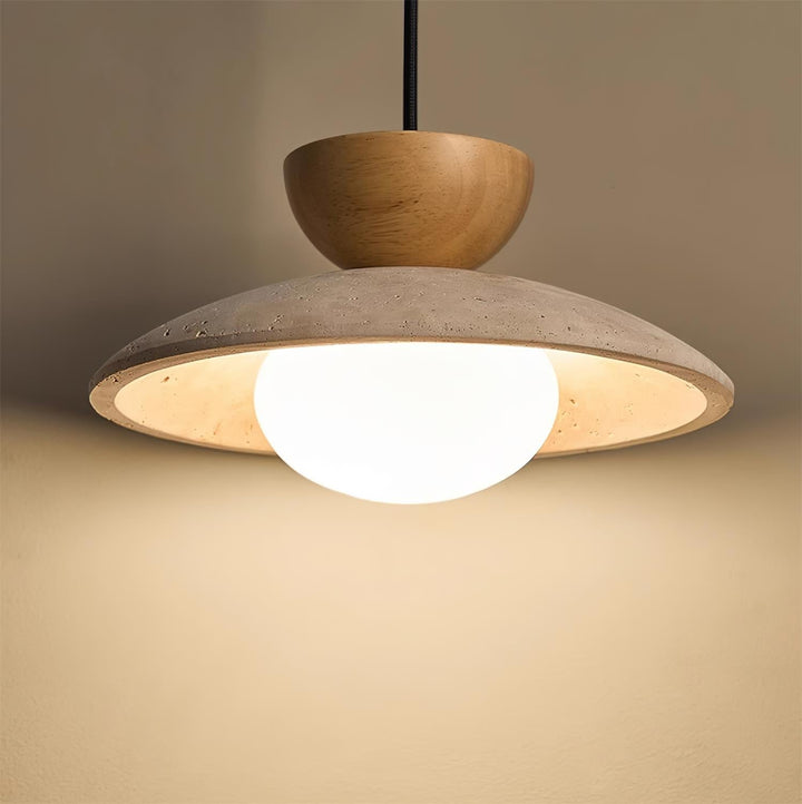Contemporary Yarelle pendant light. Natural travertine, solid wood, and clear glass. Modern dining lighting.