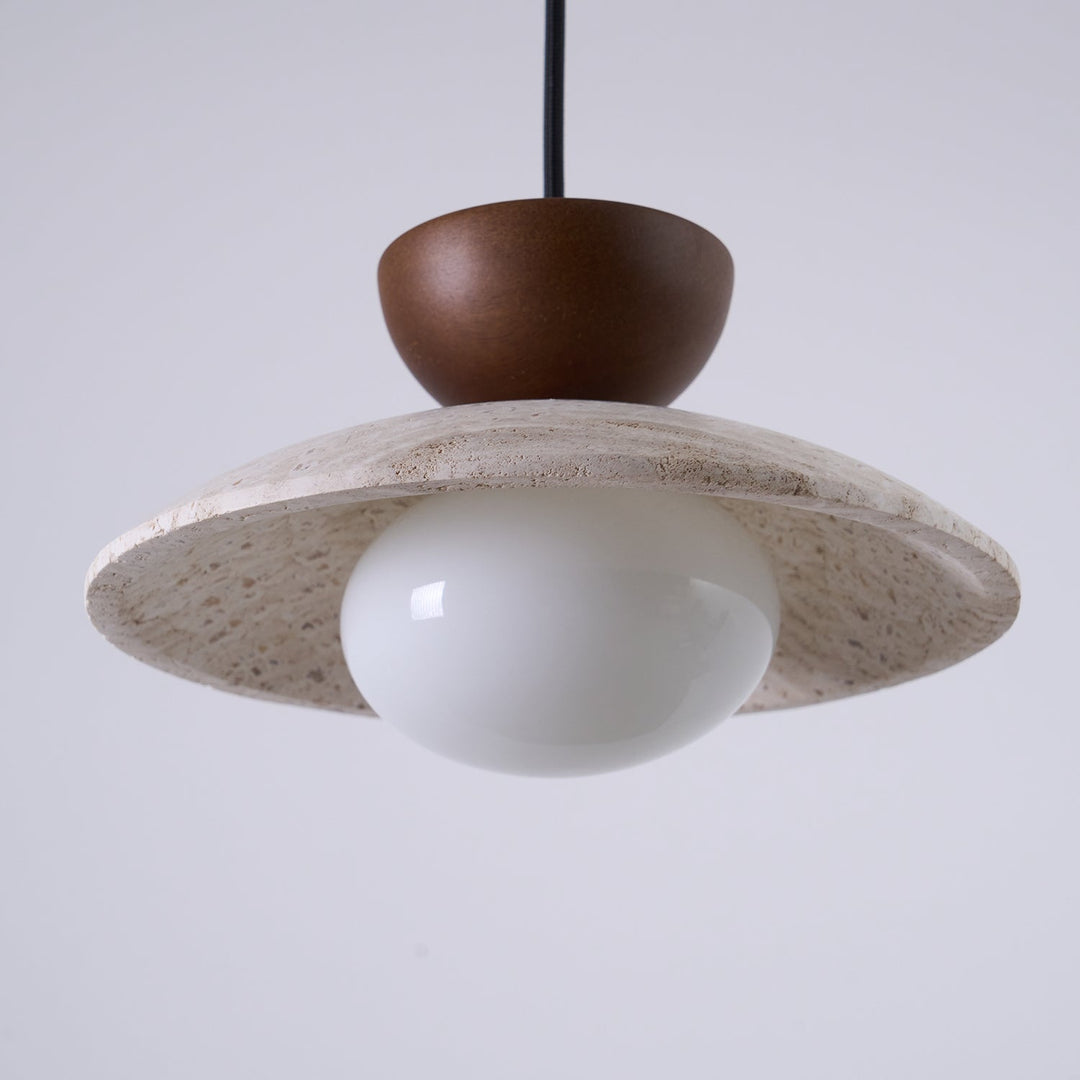 Yarelle pendant light showcasing beautiful travertine stone patterns & smooth wood grain. Modern home decor.