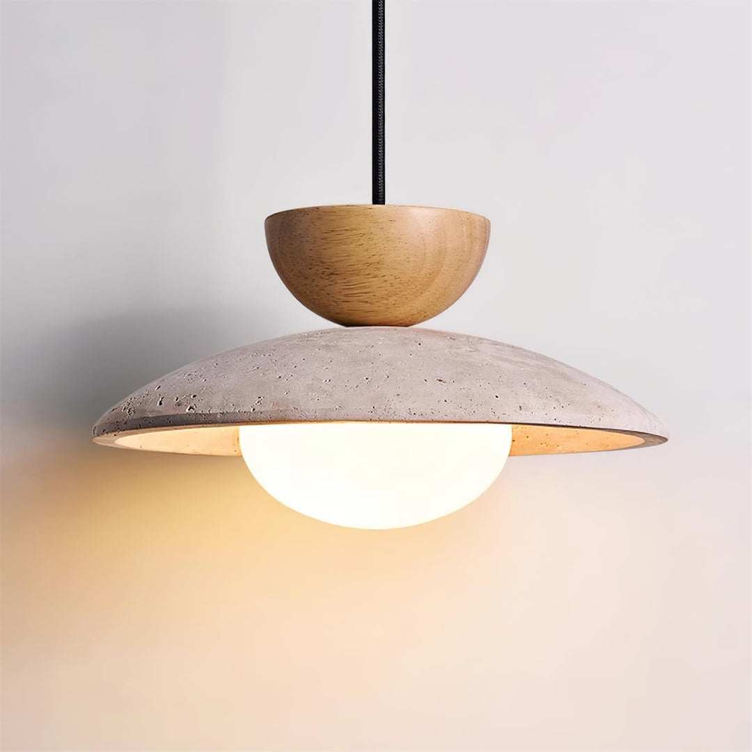 Luxurious Yarelle pendant light with natural travertine, wood, & clear glass. Perfect modern home decor.