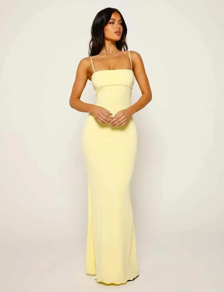 Elegant yellow backless bodycon maxi dress for women, perfect for evening parties & formal occasions.
