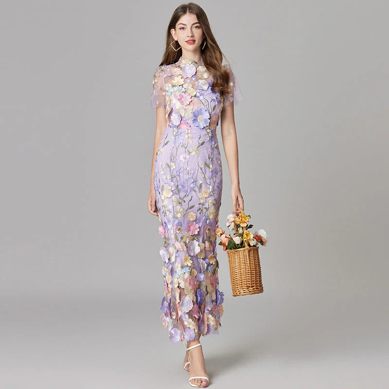 Beige embroidered mesh maxi dress for women. Sophisticated sleeveless evening gown for special occasions.