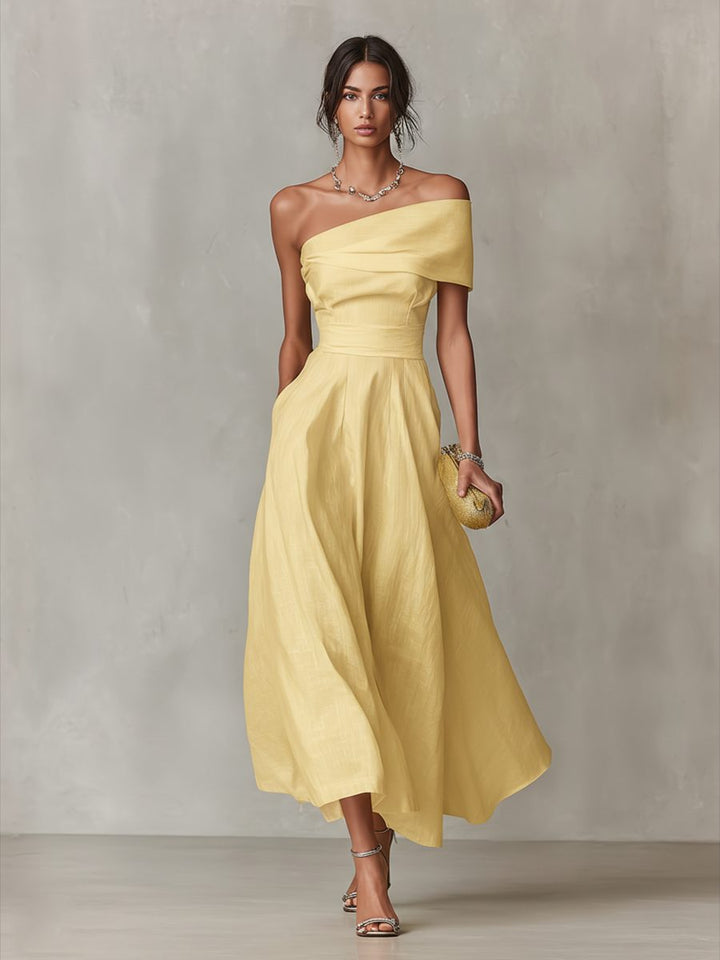 Stylish women's yellow one-shoulder midi dress with asymmetrical neckline, ideal for formal events & parties.