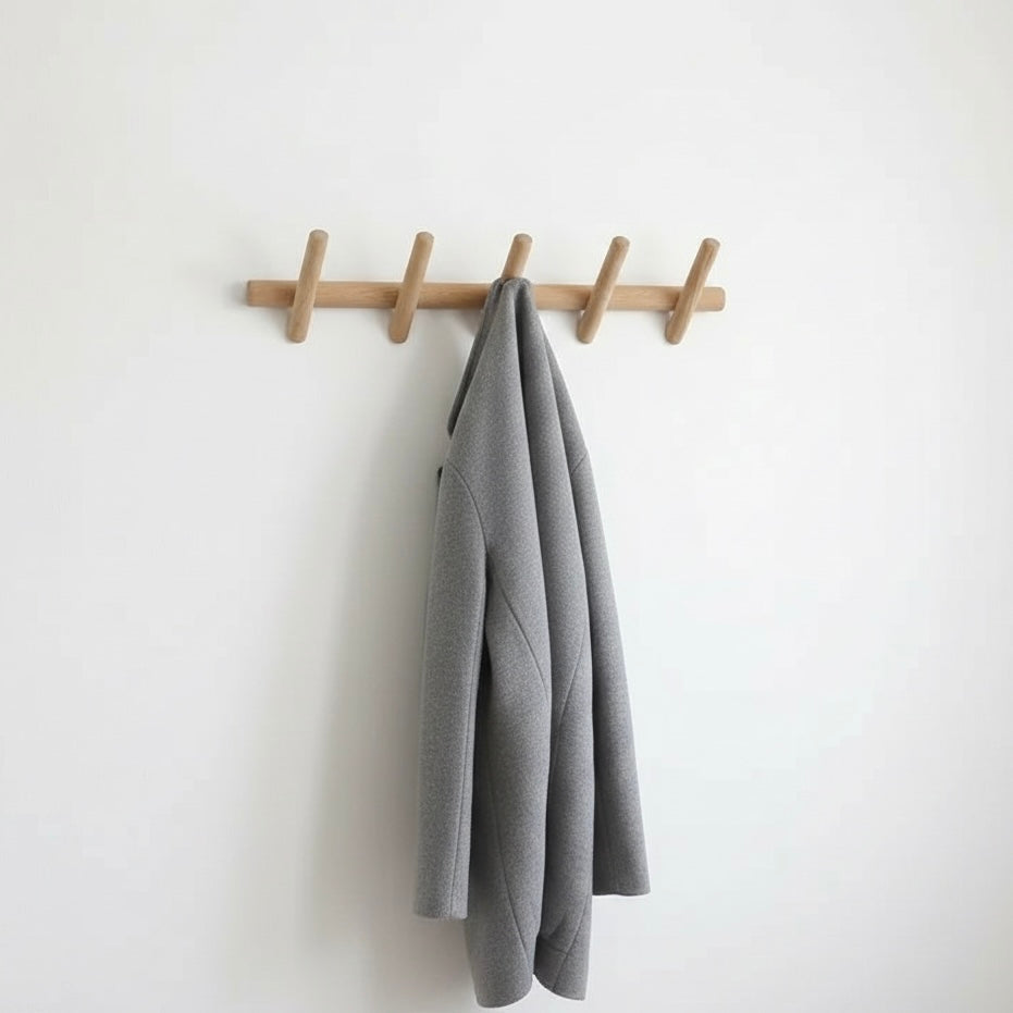 Entryway wall coat rack with 5 black hooks. Perfect modern home organization for coats, hats & keys.