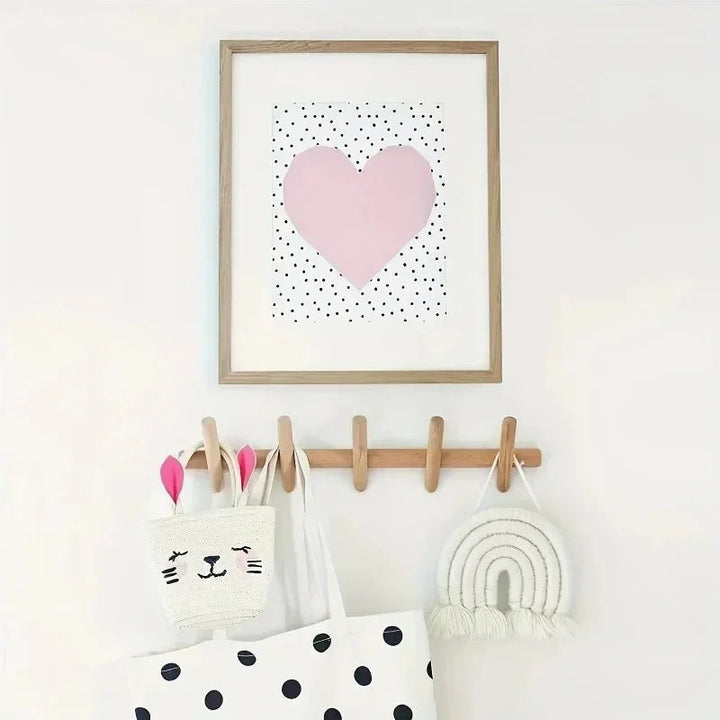 Sleek entryway coat & hat rack, featuring 5 strong hooks. Essential space-saving storage solution.
