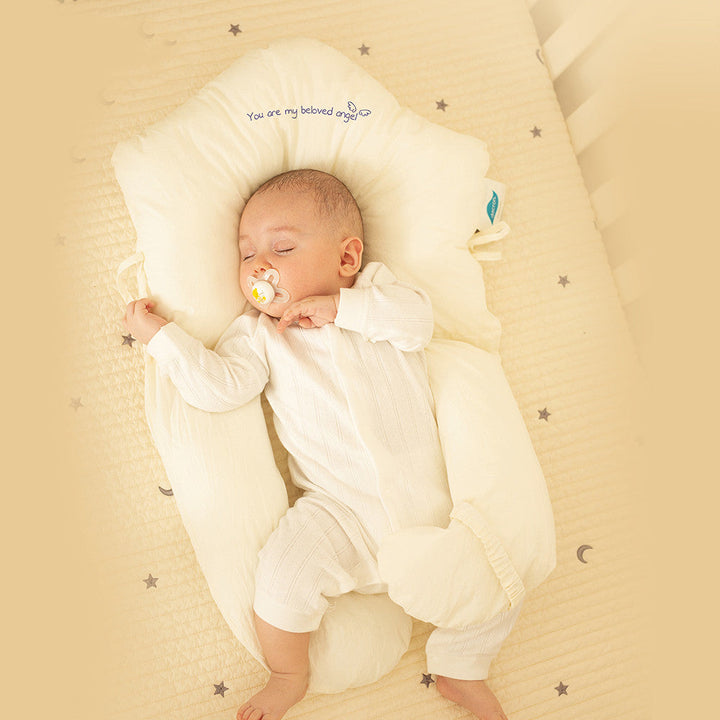 Antibacterial baby cuddle cushion for safe sleep. Ergonomic design supports infants, preventing flat head syndrome.