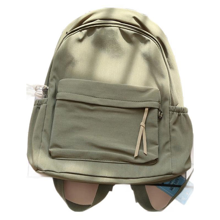 Interior view of an organized everyday backpack, with laptop sleeve and various compartments.