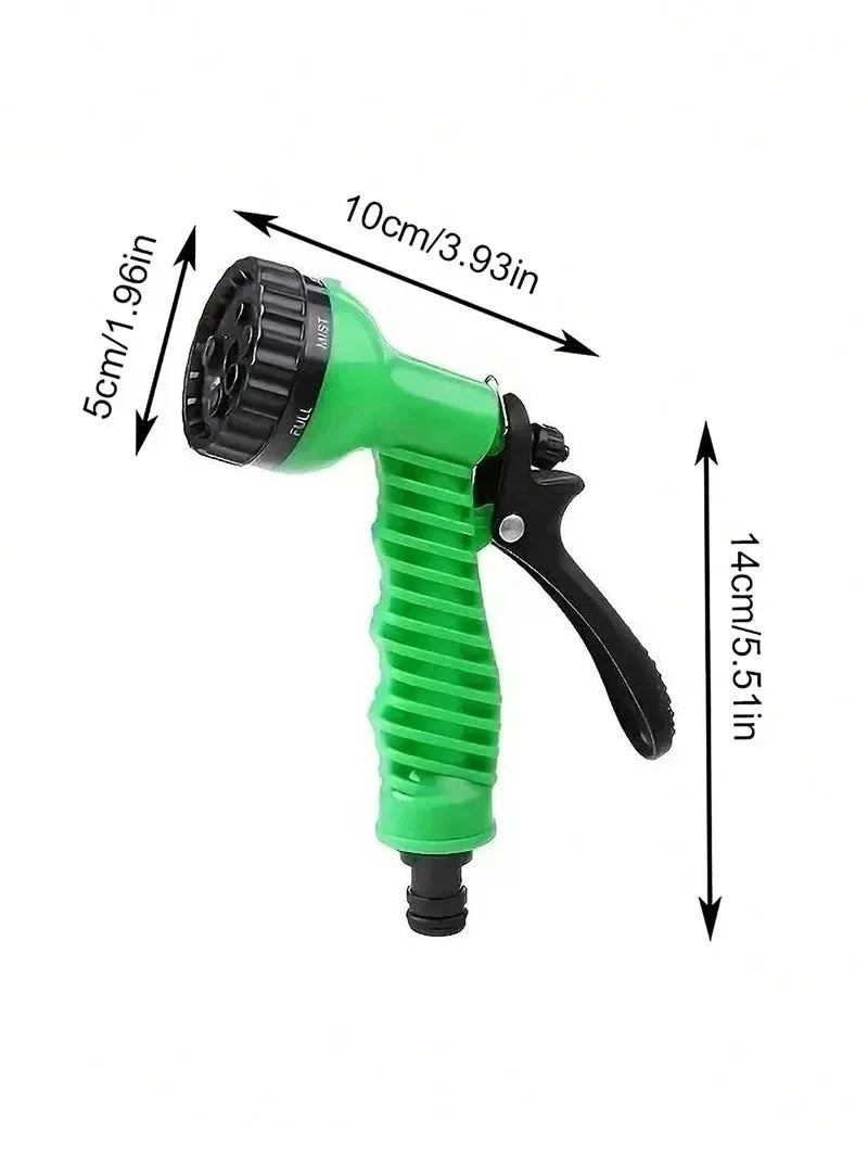 Hand comfortably holding the ergonomic 7-function spray nozzle of an expandable garden hose for watering.