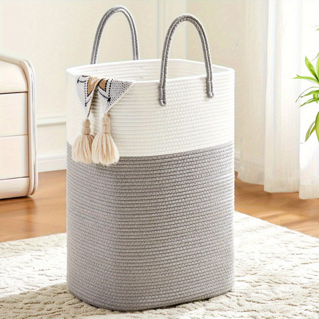 Hand-woven, extra large rope storage basket with braided handles. Ideal clothes hamper, toy bin, or decorative accent.