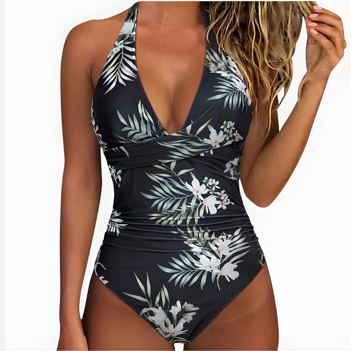 Vacation ready women's flattering swimsuit. One-piece, light shaping, ultimate comfort.