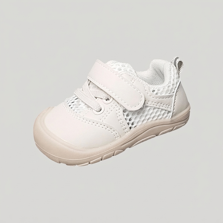 Close-up of flexible, non-slip sole on baby barefoot shoes for safe first steps & natural foot development.