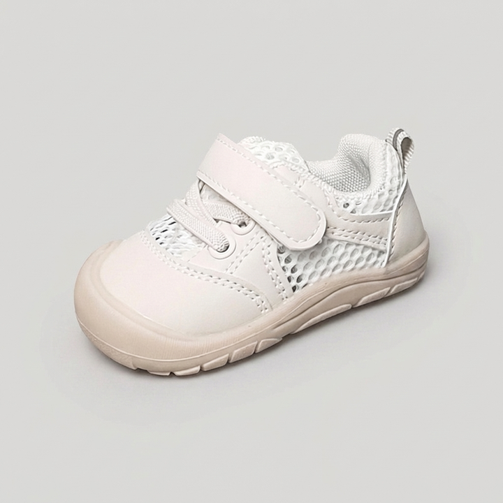 New baby barefoot shoes with flexible sole, designed for natural foot development and comfort.