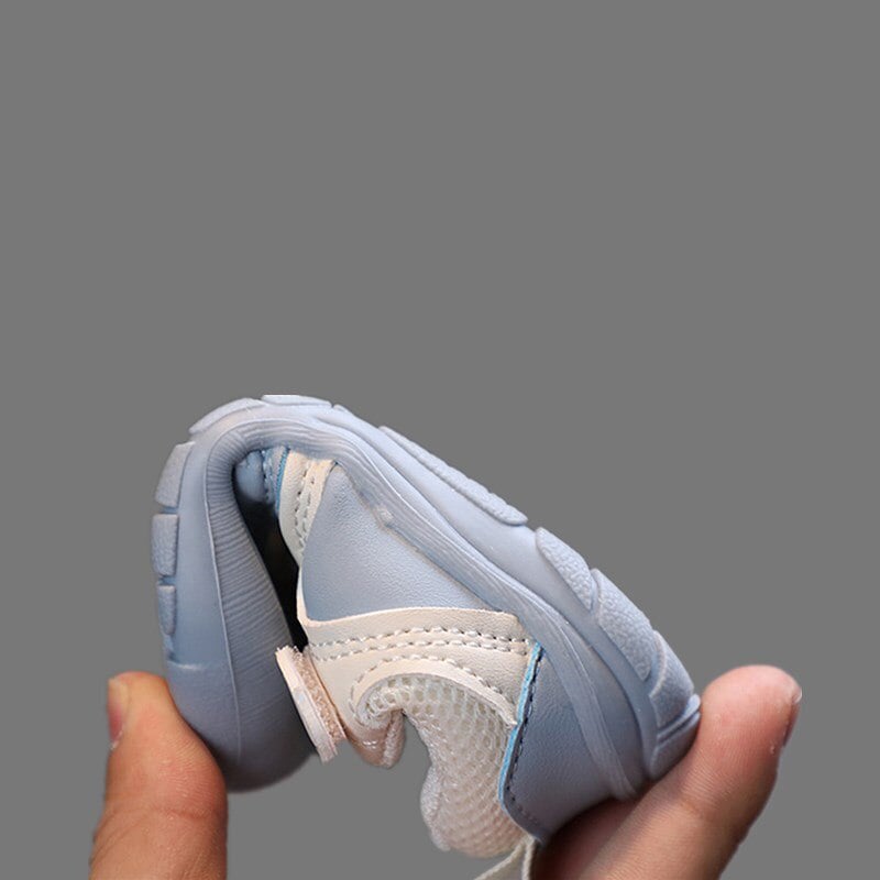 First walker baby shoes: flexible, non-slip, and secure for natural foot development and confident steps.